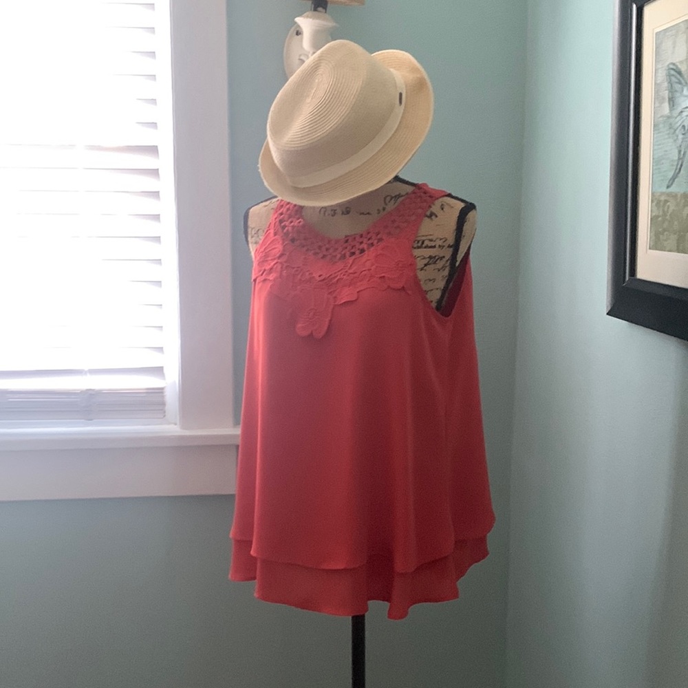 Size S Tunic with neckline details. Dressy or casual, just an easy to wear top